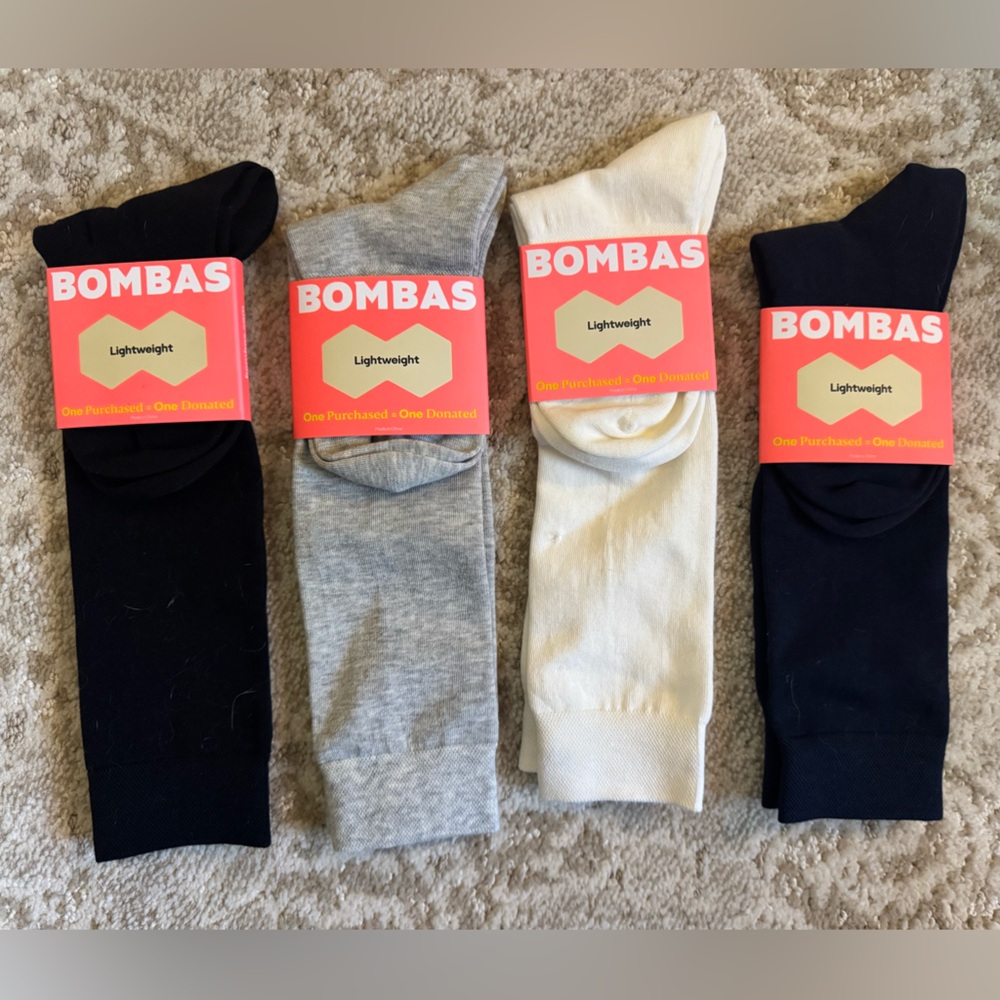 4 youth Bombas lightweight knee high socks. Will sell individually as well.